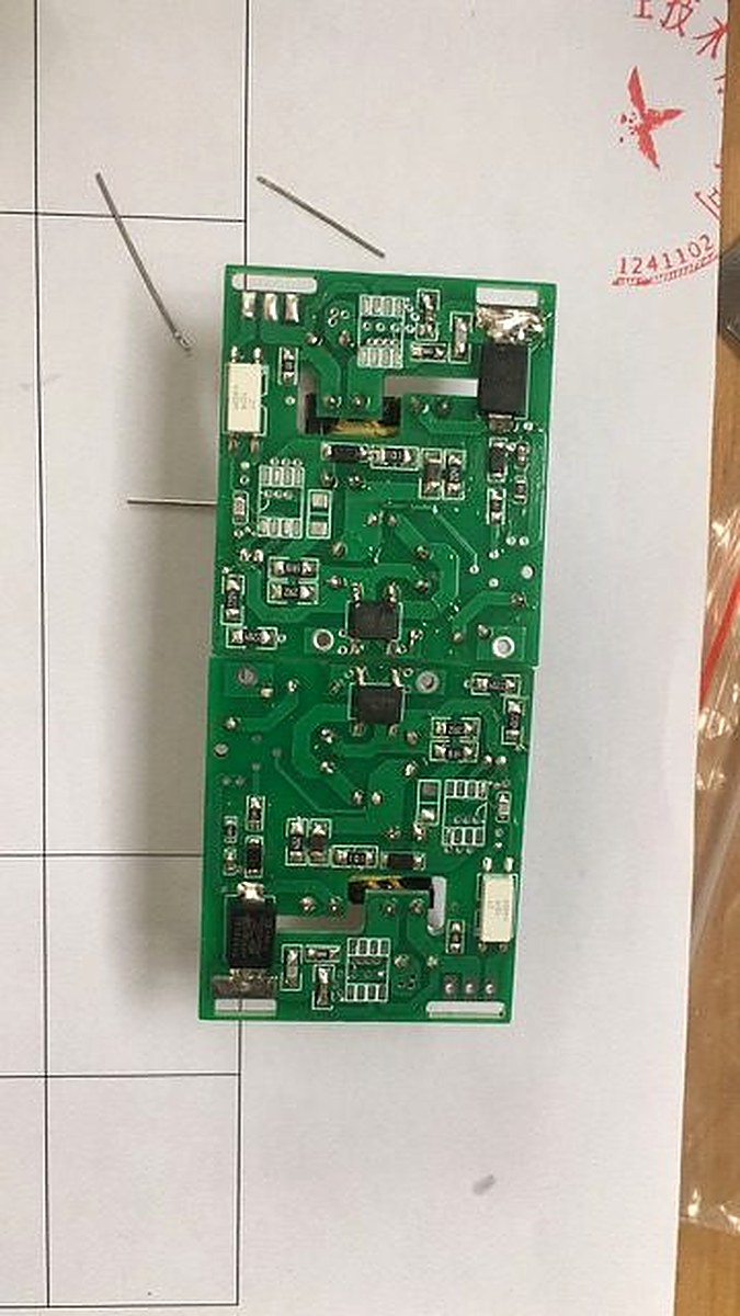 Custom Charlie Charger PCB — power supply board with switching components, transformer, and control circuitry